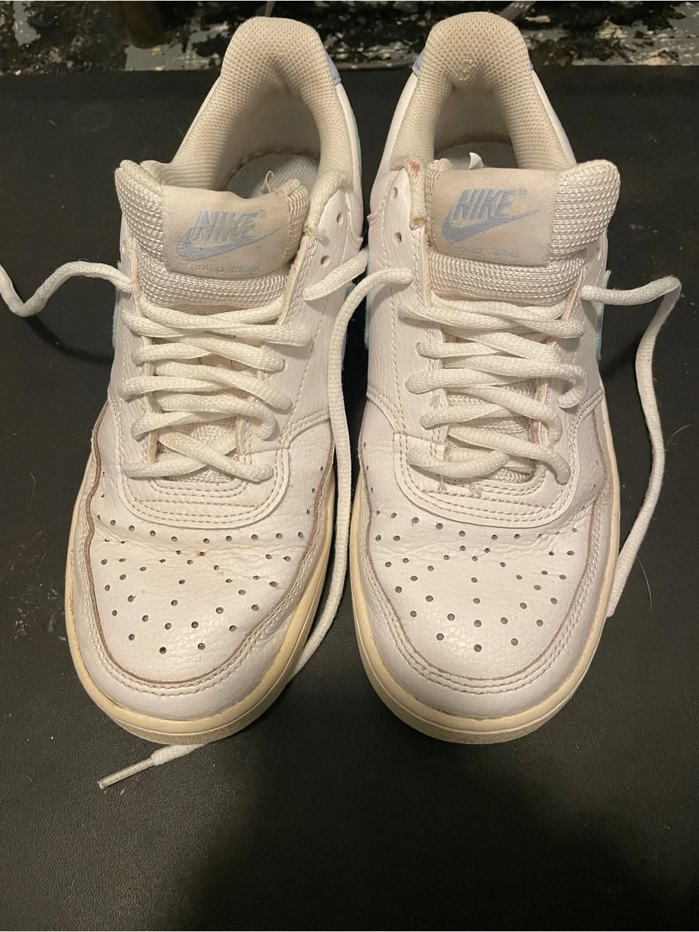 Nike White Low-Top Sneakers with Light Blue Swoosh